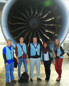 JU MBA student Daniel Pruitt (far left) and Aviation Management student  Steven Paduchak (center) touring Lufthansa Airlines with other aviation students in Germany.