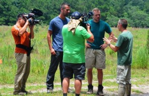 JU's Dr. John Enz, far right, being interviewed for the "Rock the Park" TV show with show hosts Colton Smith (tan shorts) and Jack Steward (blue shirt) on Cumberland Island National Seashore. 